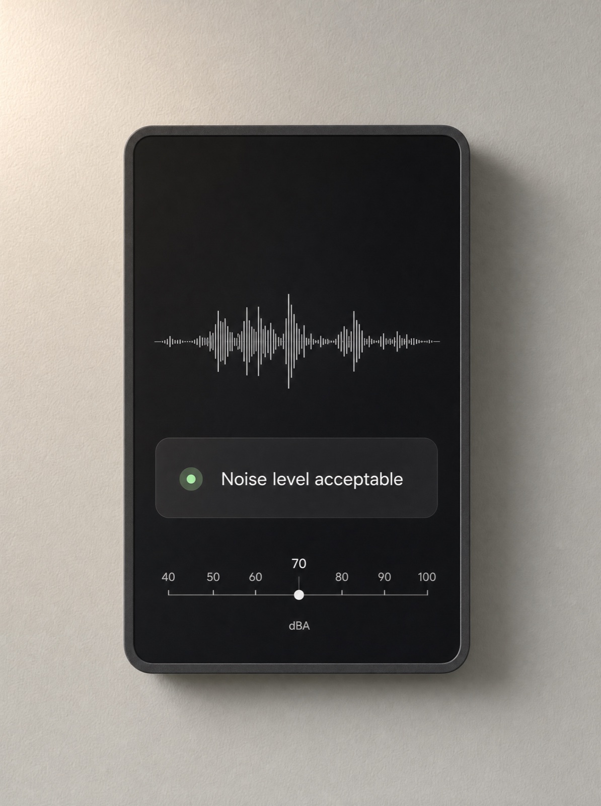 NOIZE Smart Hub wall-mounted touchscreen showing a live acoustic waveform, status message, and dBA scale
